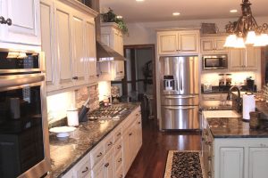 large functional white kitchen cabinetry