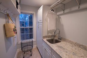 laundry room coordinating with kitchen